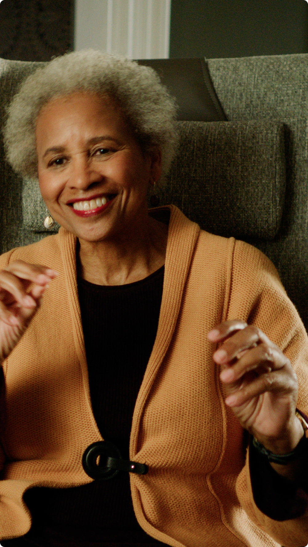 Smiling woman sitting in chair
